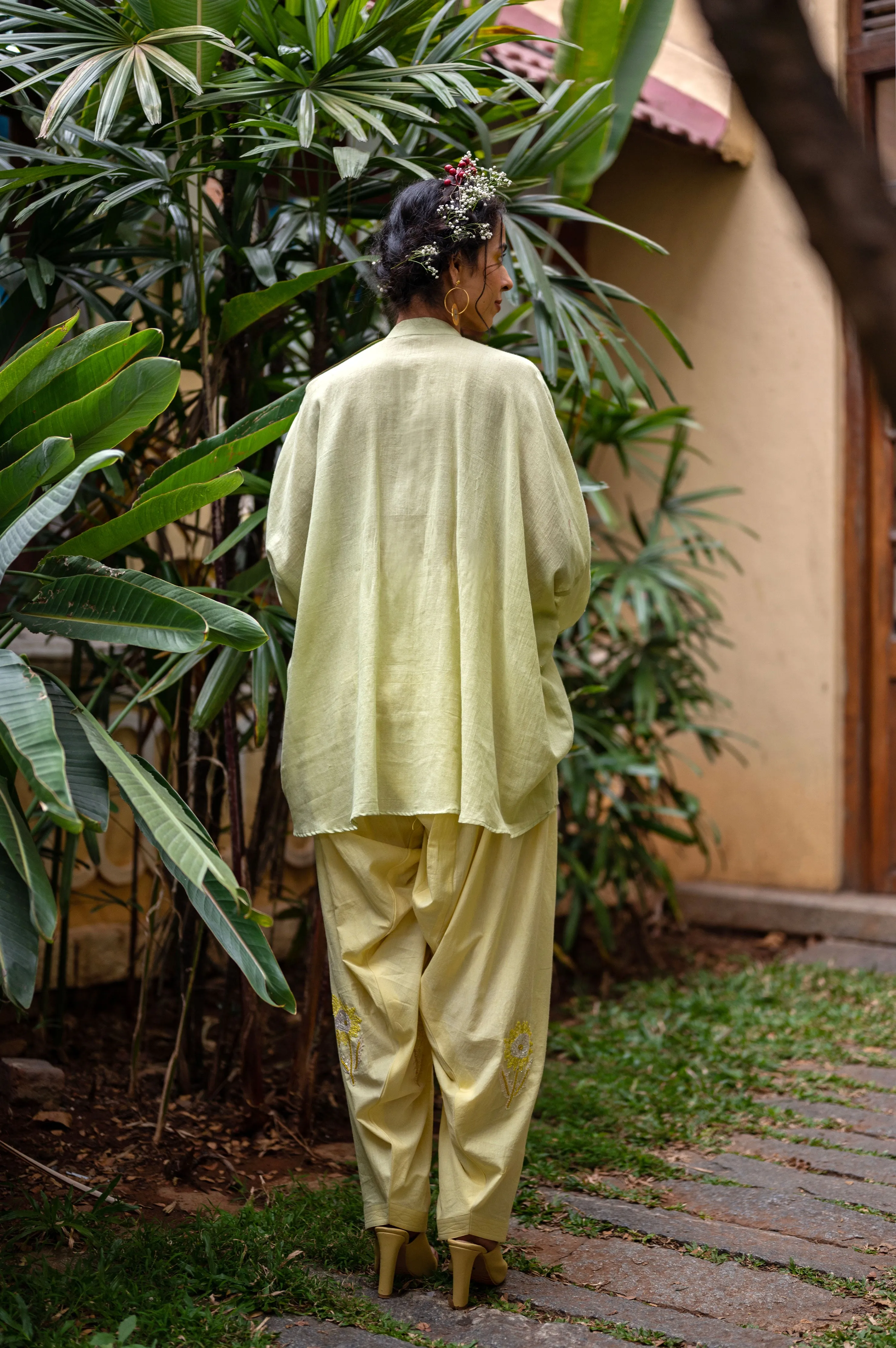 Cotton patiala pants with hand embroidered sunflower sequence motifs