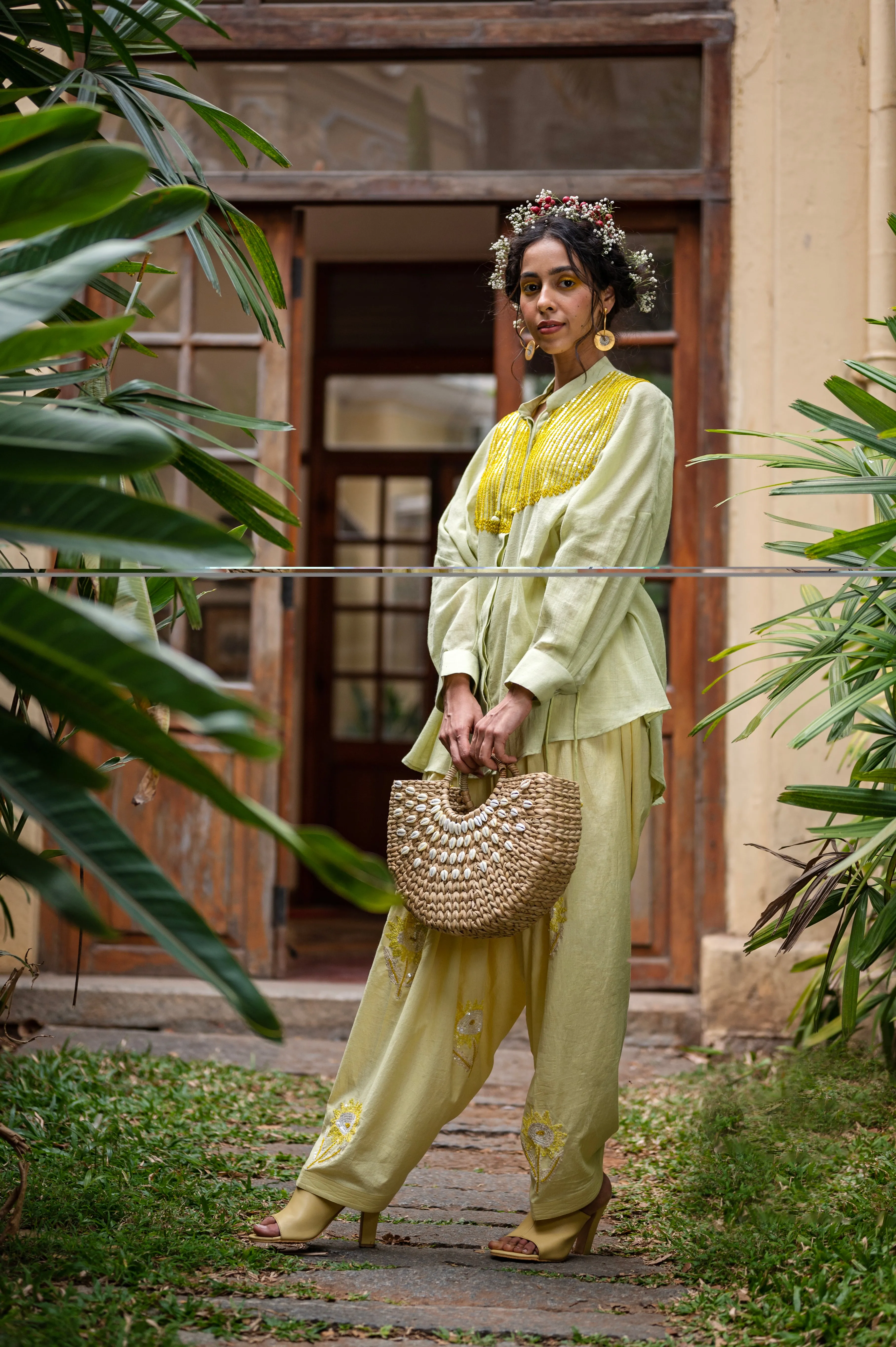 Cotton patiala pants with hand embroidered sunflower sequence motifs